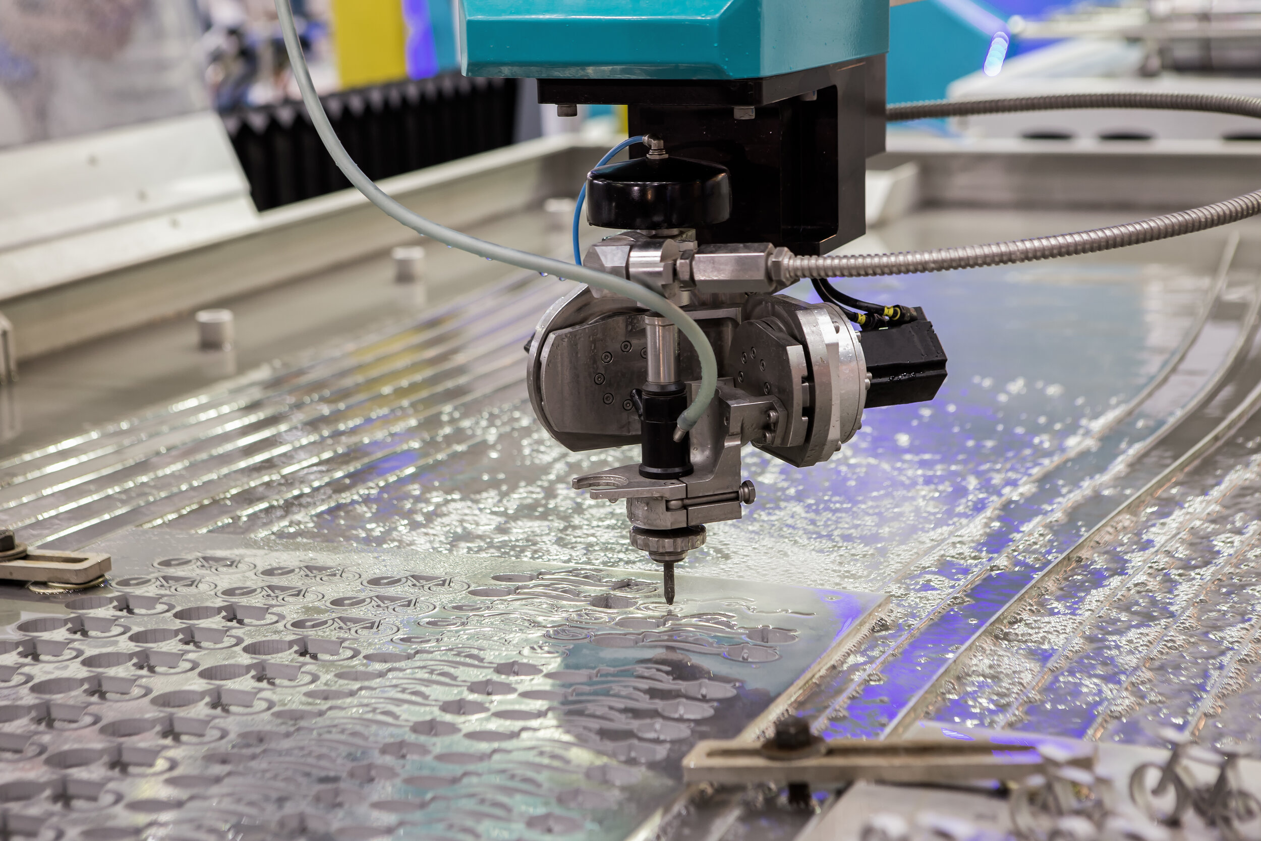 The water jet cutting CNC machine in working